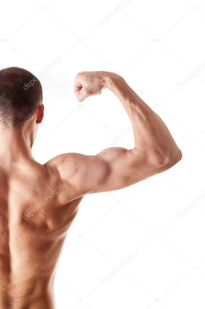 Muscular young man showing his biceps