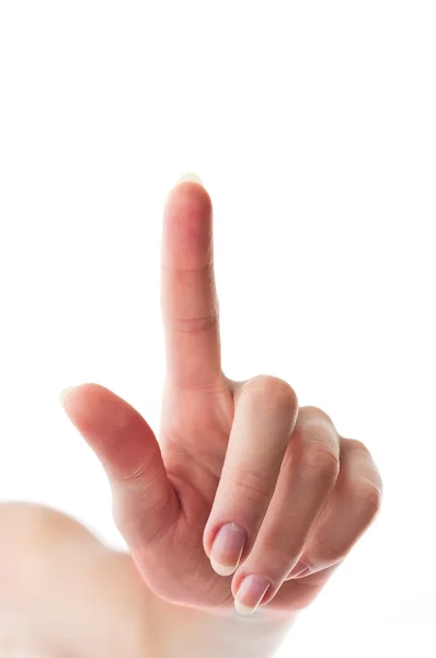 Female hand with a finger touching somethimg — Stockfoto