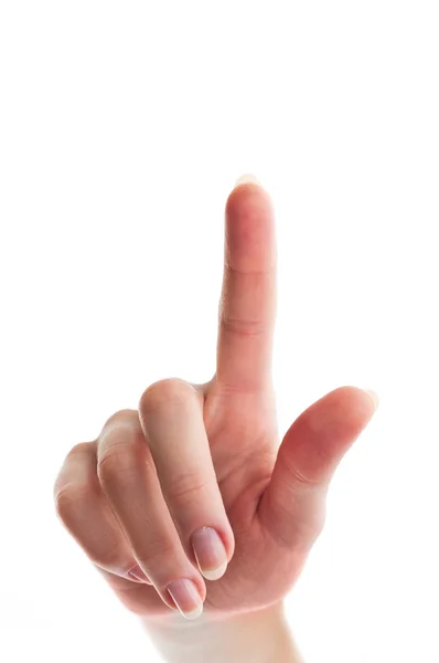 Weibliche Hand mit einem Finger, der etwas berührt — Stockfoto