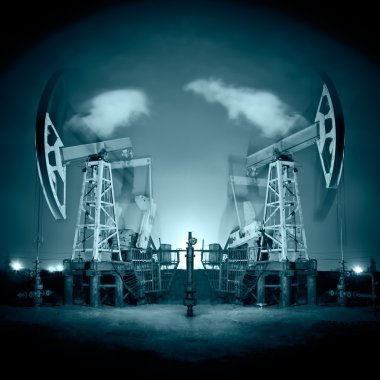 Oil Rigs at night. clipart