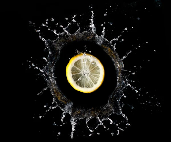 stock image Lemon in water splash