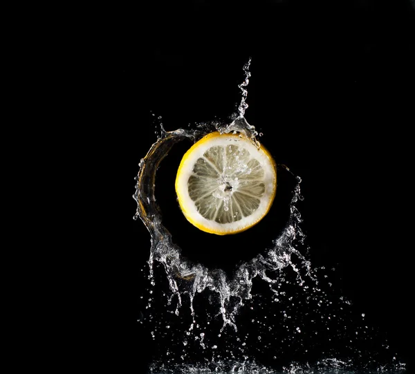 stock image Lemon in water splash