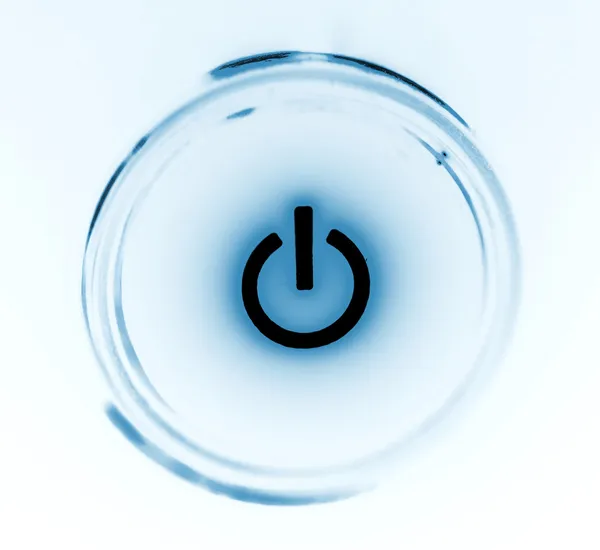 Monitor botão de energia close-up na escuridão — Fotografia de Stock