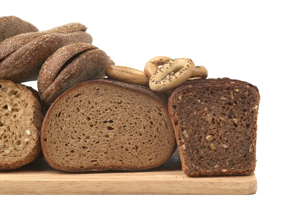 Bread on wood board. — Stock Photo, Image