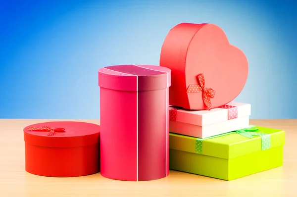 Giftboxes against gradient background — Stock Photo, Image