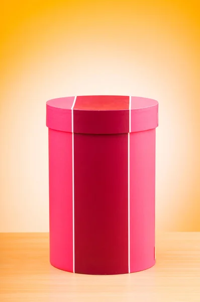 Giftboxes przeciw tło gradientowe — Zdjęcie stockowe