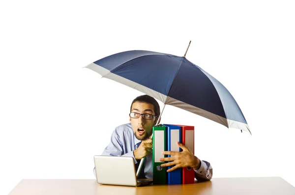 Geschäftsmann mit Regenschirm im Büro — Stockfoto