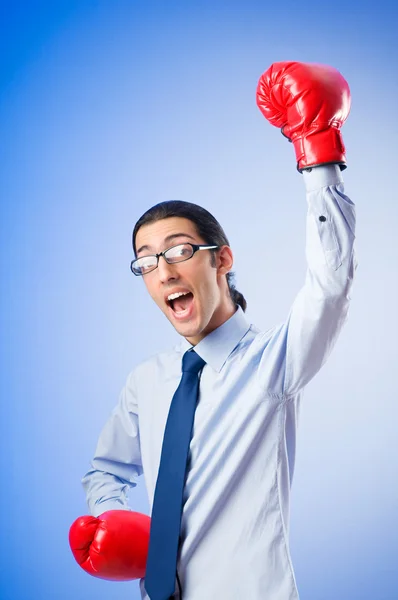 Businessman with boxing gloves — Stock Photo, Image