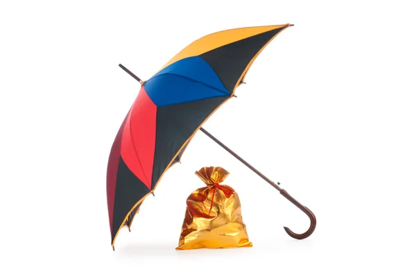 stock image Golden sacks under protection of umbrella