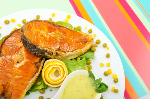 Roasted salmon in the plate — 스톡 사진