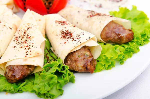 Meat kebabs wrapped in pita — Stock Photo, Image