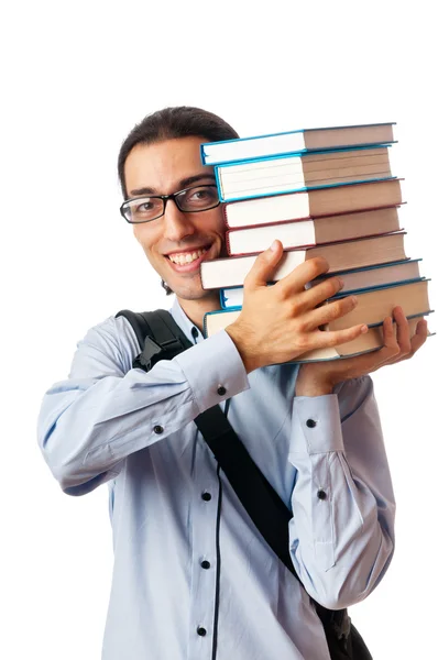 Estudiante con pila de libros sobre blanco —  Fotos de Stock