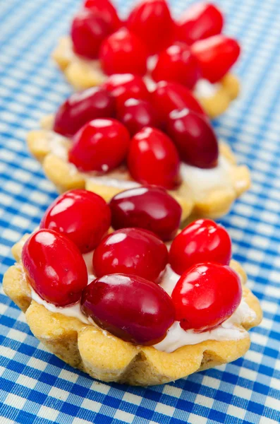 Fruit cakes with cornel berries — Stock Photo, Image