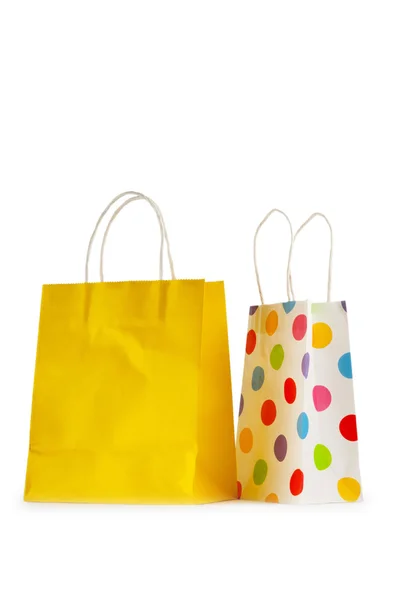 Barevné papírové nákupní tašky izolované na bílém — Stock fotografie