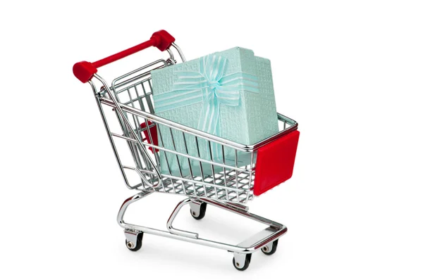Shopping cart and giftboxes on white — Stock Photo, Image