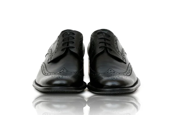 Concetto di moda con scarpe maschili su bianco — Foto Stock