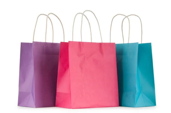 Colourful paper shopping bags isolated on white Royalty Free Stock Images