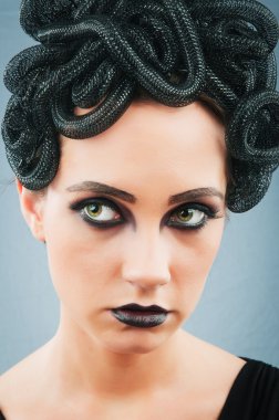 Woman depicting the concept og Evil (Medusa Gorgon) clipart