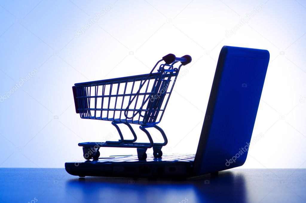Silhoette of laptop and shopping cart
