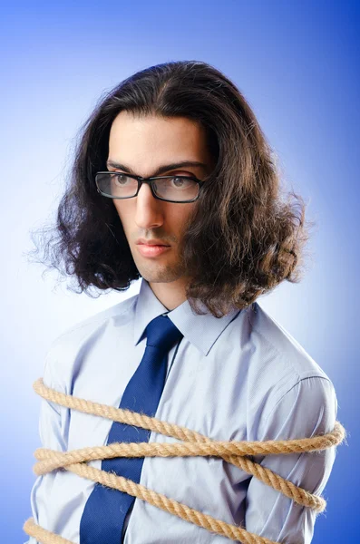 Joven hombre de negocios atado con cuerda —  Fotos de Stock
