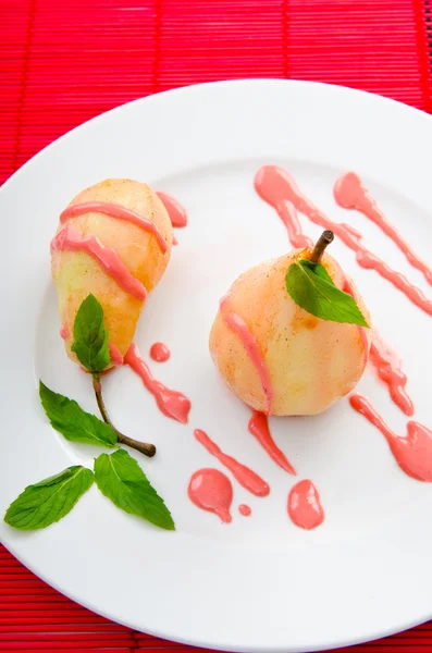 Dessert med pære i sauce - Stock-foto