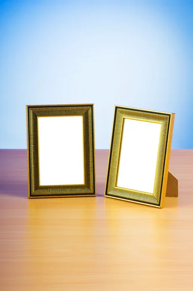Wooden picture frames on the gradient background — Stock Photo, Image