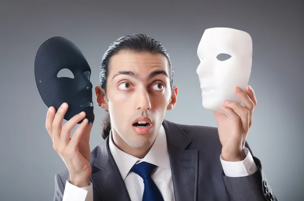 Industriespionage-Konzept mit maskiertem Geschäftsmann — Stockfoto