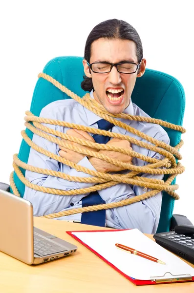 Young businessman tied with rope — Stock Photo, Image