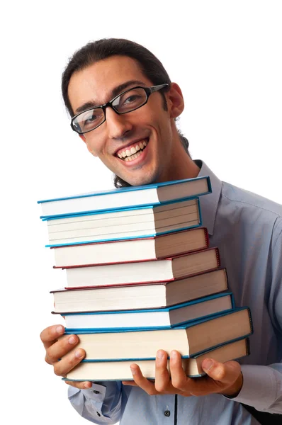 Estudante com pilha de livros sobre branco — Fotografia de Stock