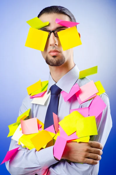 Young businessman with reminder notes — Stock Photo, Image