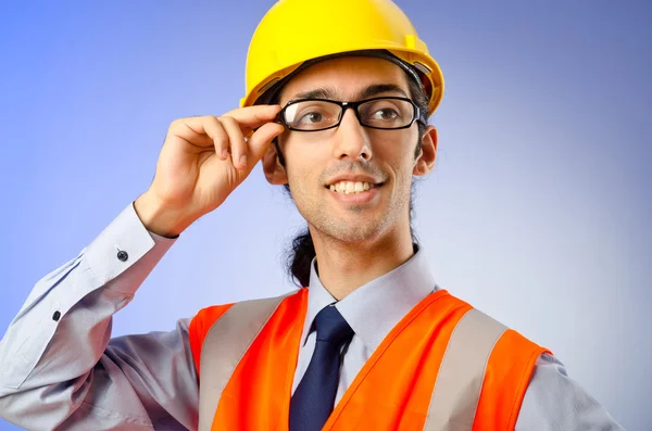 Young construction worker with hard hat — Stock Photo, Image