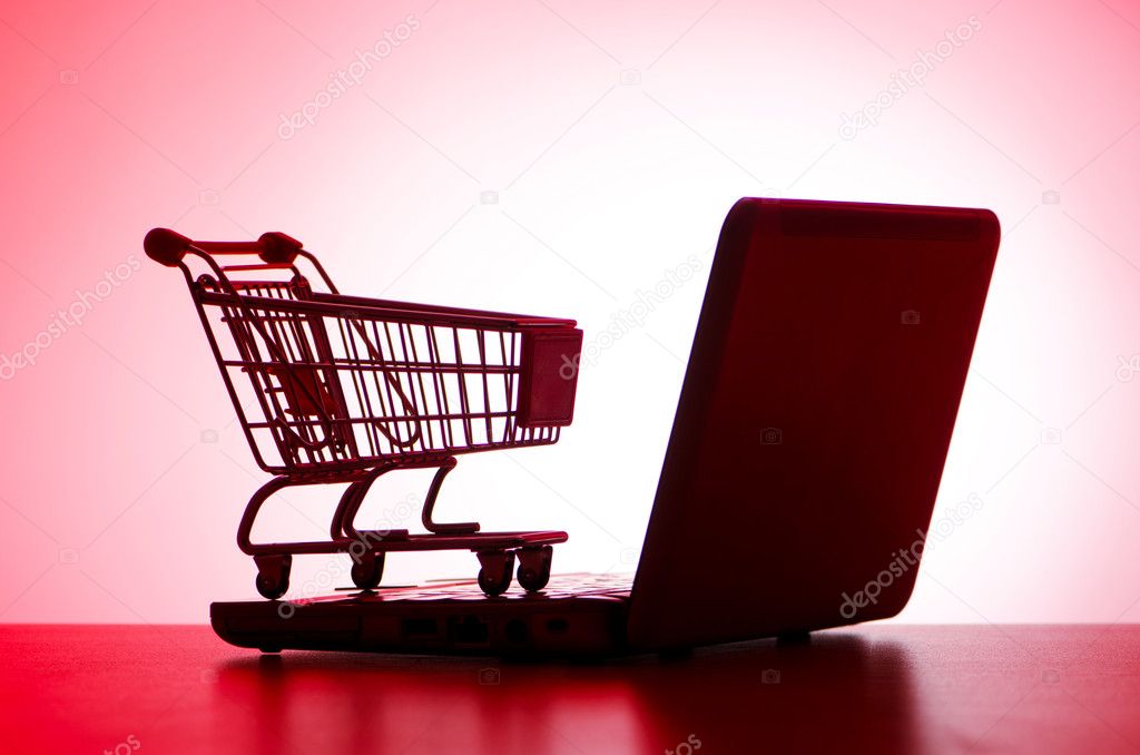 Silhoette of laptop and shopping cart