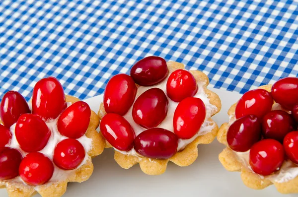 Pastries with berries in the plate — Stock Photo, Image