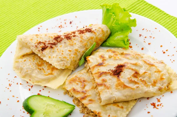 Pancakes stuffed with minced meat — Stock Photo, Image