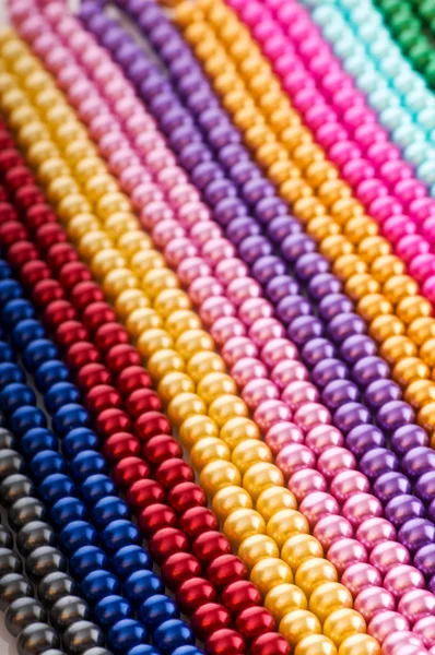 Astratto con collane di perle colorate — Foto Stock