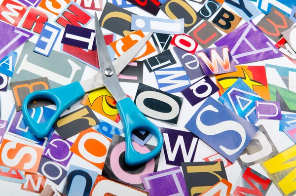 Cut letters from newspapers and magazines — Stock Photo, Image