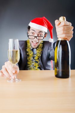 Drunken businessman after office christmas party clipart