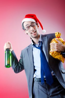 Drunken businessman after office christmas party clipart