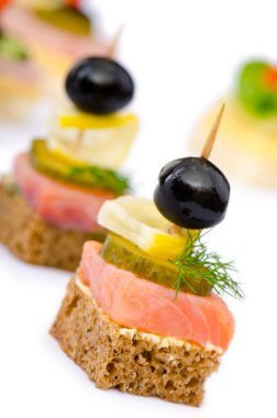 Canape served in the plate clipart