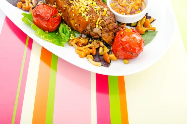 Lamb leg served in the plate — Stock Photo, Image
