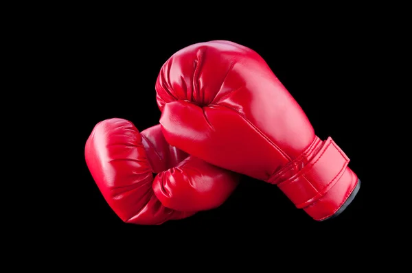 Red boxing gloves isolated on black — Stock Photo, Image