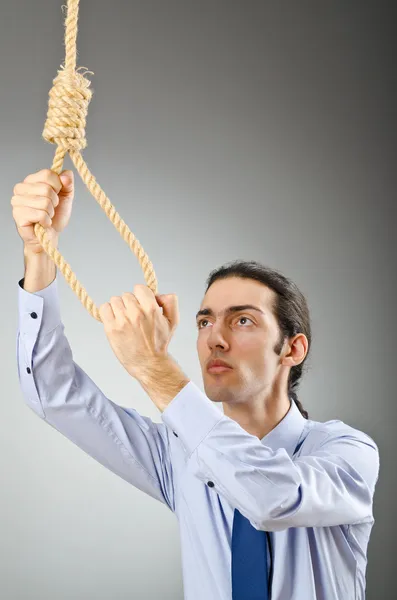 Businessman with thoughts of suicide — Stock Photo, Image