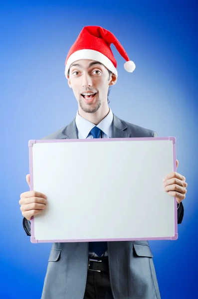 商人与圣诞老人帽子和消息 — 图库照片