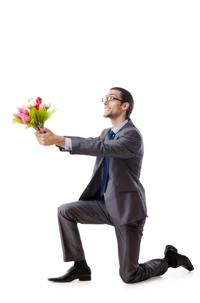 Empresario ofreciendo flores de tulipán —  Fotos de Stock