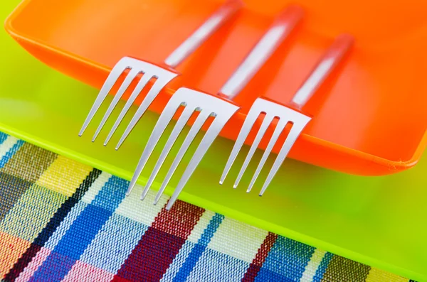 Empty plate with utensils — Stock Photo, Image