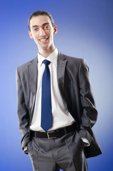 Young businessman in studio shooting — Stock Photo, Image