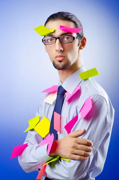 Young businessman with reminder notes — Stock Photo, Image