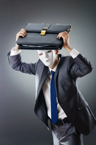 Průmyslové espionate koncept s maskovaný podnikatel — Stock fotografie