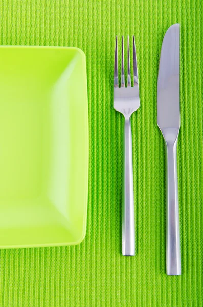 Üres tányér evőeszközzel — Stock Fotó