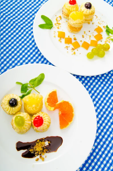 Tasty sweets in the plate — Stock Photo, Image